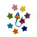 Juego de ensartar cohete y estrellas